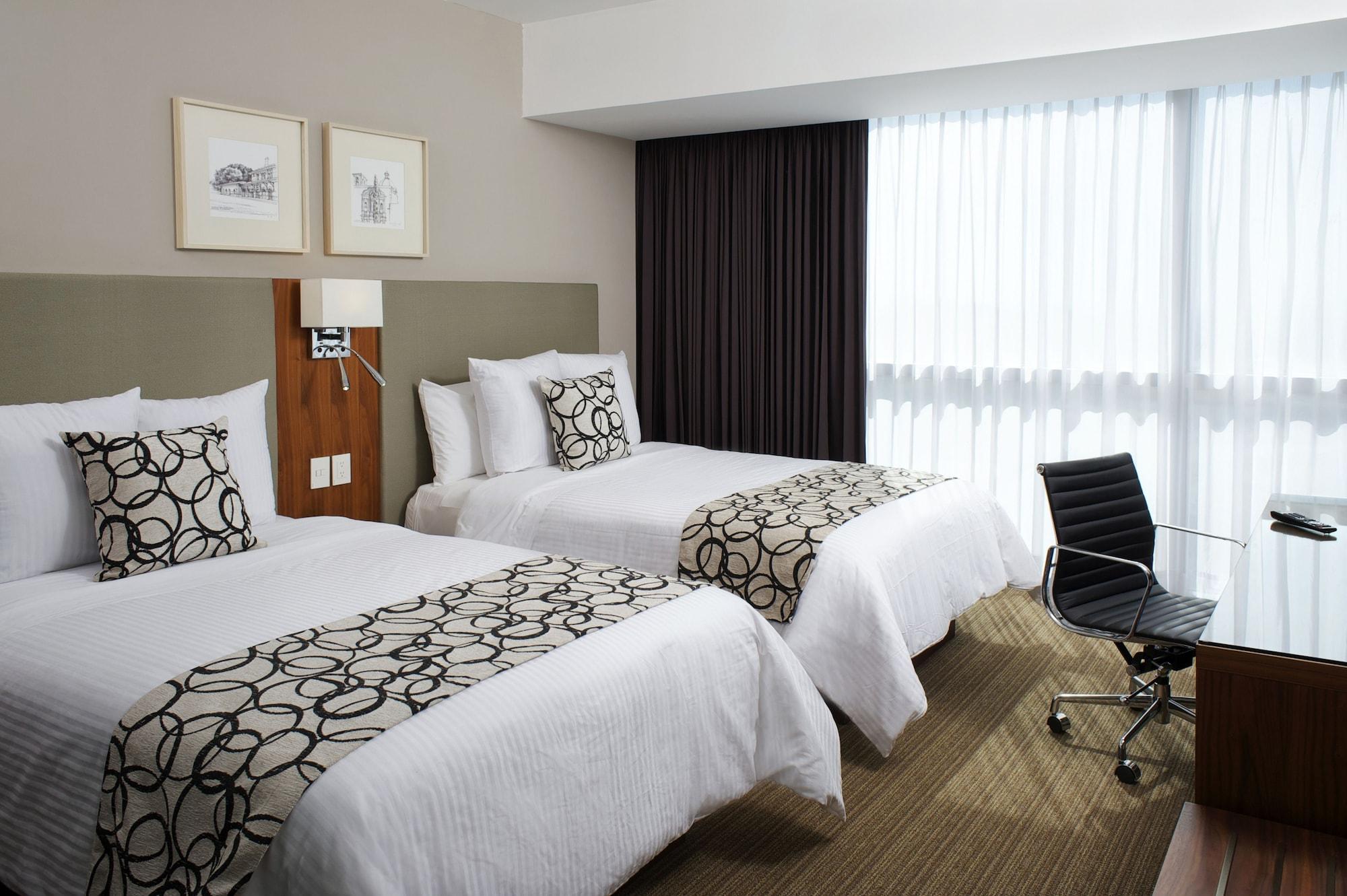 Casa Inn Premium Hotel Queretaro Miranda Екстер'єр фото A room at the hotel